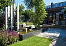Biesot Tuinen & Parken tuinaanleg tuinontwerp tuinarchitectuur tuinarchitect stijlvolle stadstuinen comfort luxe outdoor living outdoor design buitenmeubelen tuinmeubelen tuinmeubels tuinen villatuin exclusieve tuinen chique hovenier hoveniersbedrijf ontwerp realisatie The Garden Store afwerking groene oase sfeer tuininspiratie buitenkamer terras variatie Belgisch magazine Chic Gardens